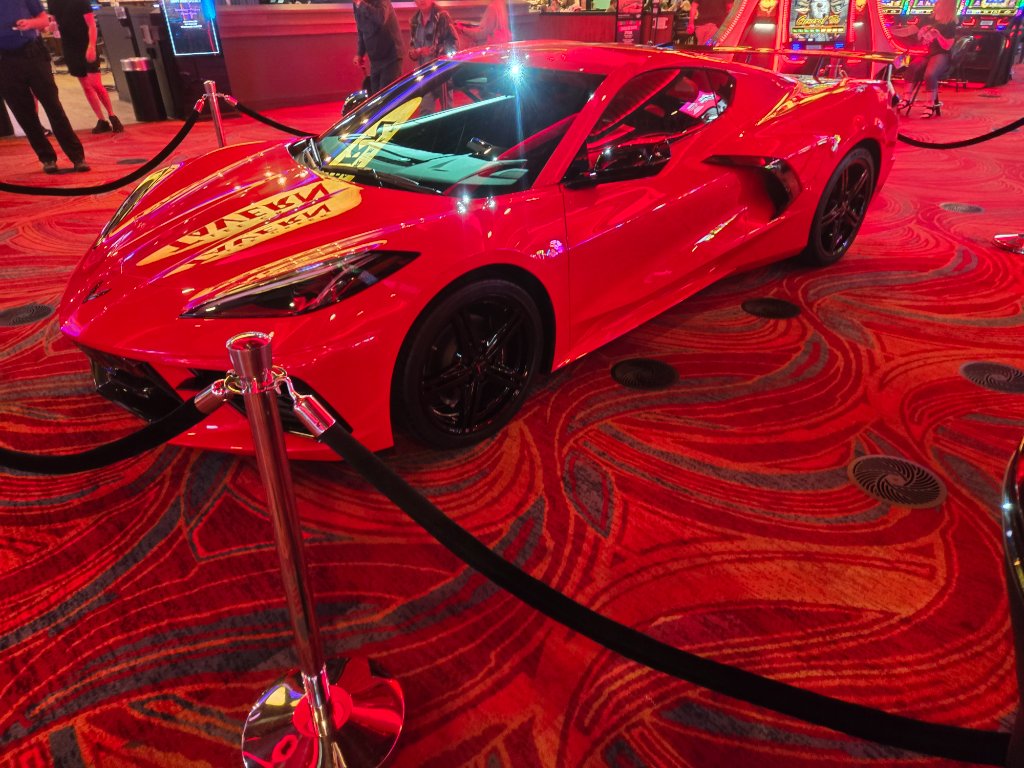 Detailed red Corvette with a mirror-like gloss